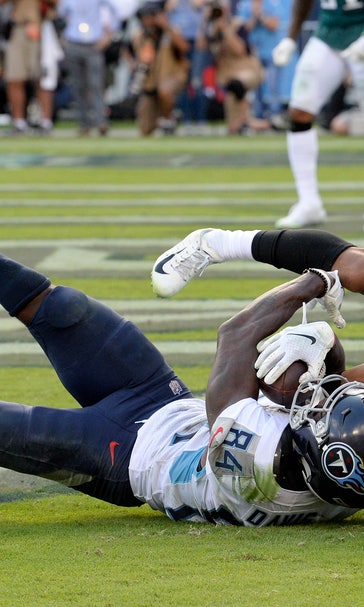 Titans edge Eagles 26-23 on TD pass late in OT